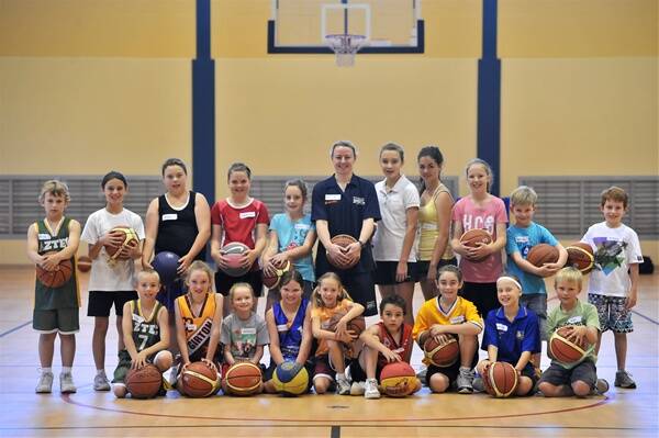 ON COURT: Kristi Harrower and the keen basketballers at Girton Grammar’s gym.