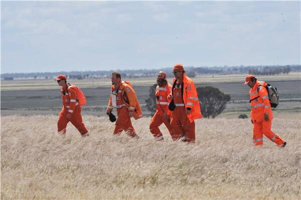 HUNT: Volunteers return after the line search for Krystal Fraser east of Pyramid Hill.