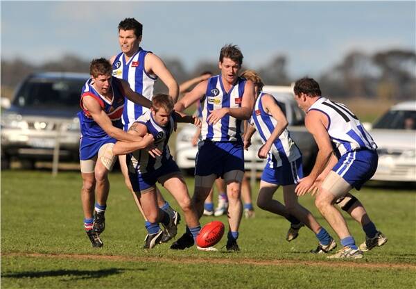 NUMBERS: A mob of Superoos surround the ball in Mitiamo's clash with Pyramid Hill.