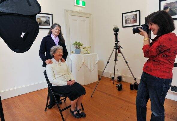 Model mother: Faye Collin and her mum Joyce Clarkson have their portrait taken for the Imagining and Imaging Mums exhibition.