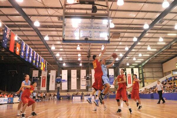 HEAT IS ON: Sydney Boys High takes on China's under-16 team in yesterday's grand final. Picture: BRENDAN McCARTHY