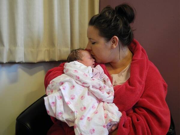Baby Addison Charlotte Lee makes Meikayla Forrest's day. Picture: Hannah Knight