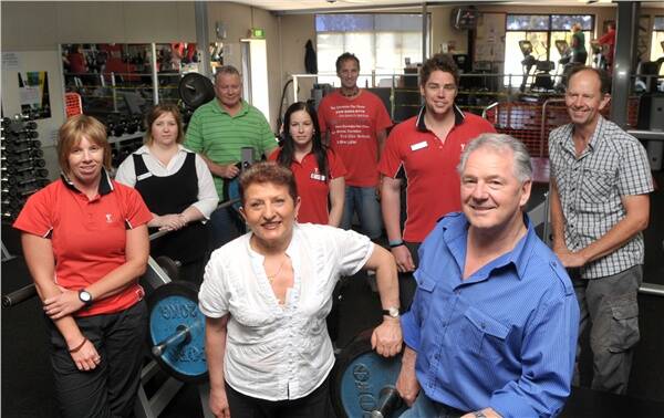 PARTYTIME: Eaglehawk YMCA celebrates 20th year since gym was built. Front: Julie Mollison, Helen Kostadinos and John Clow. Centre: Sonya Ilsley, Jess Singe, Luke Garsed and Robert Ball. Back: Bob Parker and Leslie Berry.  Picture: NICK McGRATH