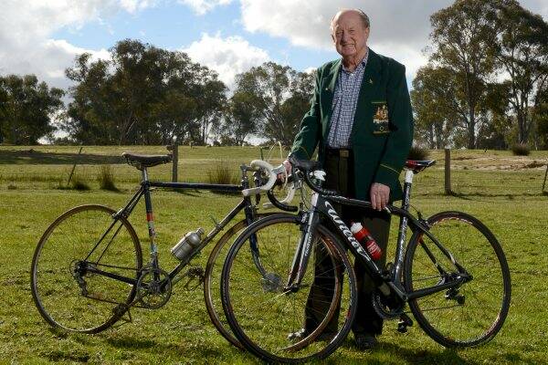 Jack Trickey with the bike he raced in the 1956 Olympics and “Black Betty” the bike he still races today. Picture: MATT KIMPTON