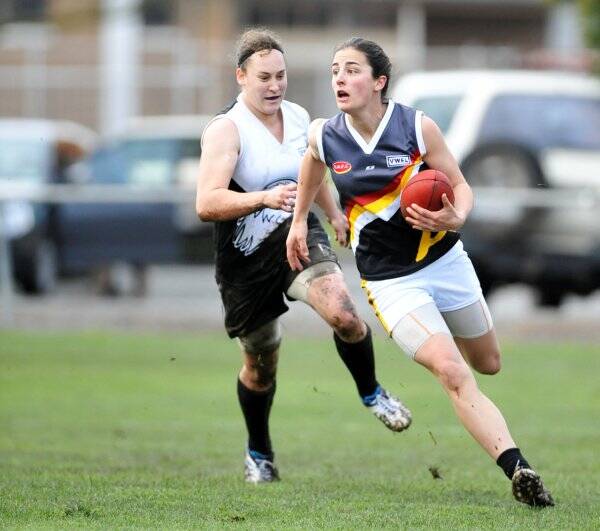 ATTACK: Angela Foley in action for Bendigo Thunder in the Victorian Women's Football League's north-west region.