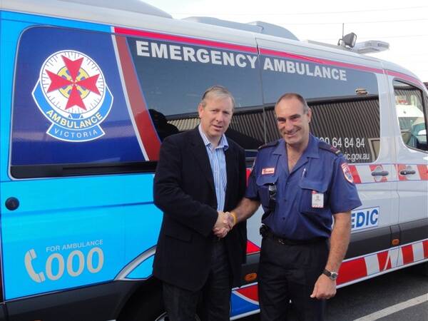 SUPPORT: Bendigo paramedic Geoff Smith is farewelled by Victorian Health Minister David Davis prior to heading to Queensland to support the post-flood recovery process.