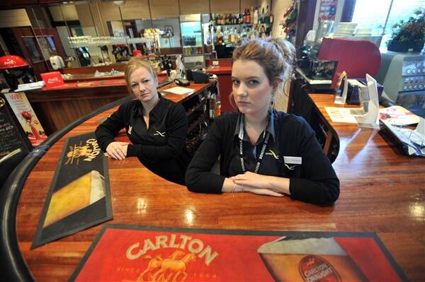 THEFT: Borough Club manager Rebecca Buggee and cashier Kimberly Callahan count their losses.