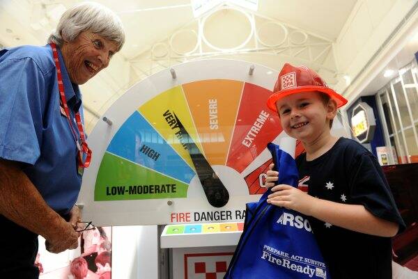 EDUCATIONAL: CFA volunteer Rosemary Williams with six-year-old Brodie Roberts. 
