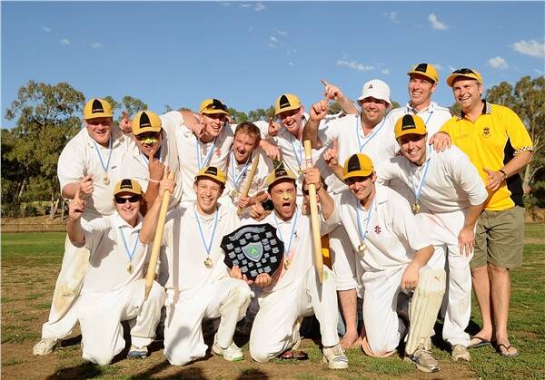 WINNERS ARE GRINNERS: Axe Creek players celebrate.