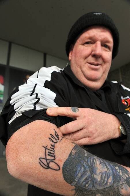 INKED: James Mills had Stephen Hendry’s signature tattooed on his arm.