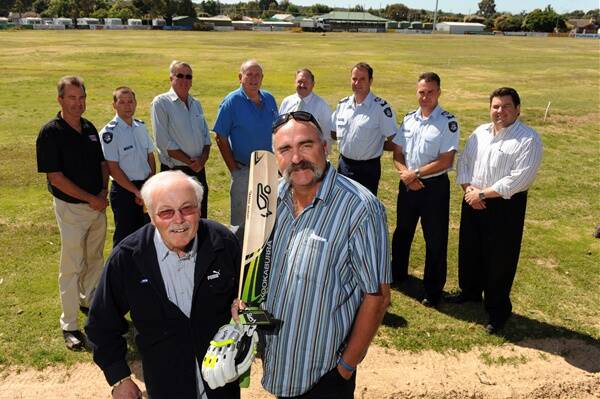 RESPECT: John Forbes with long-time friend Merv Hughes in the lead-up to tomorrow’s Twenty20 charity game.
