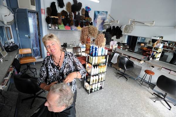 RETRO REVIVAL: Leighaire Casboult’s Mitchell Street hairdressing salon has come full circle.  Pictures: JIM ALDERSEY