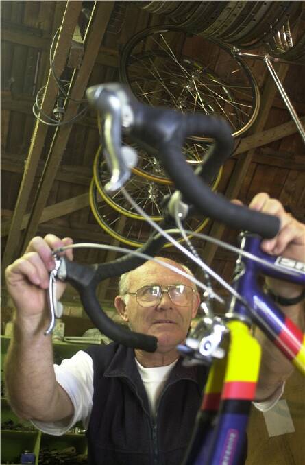 LEGEND: Frank McCaig toils away in his workshop at his Eaglehawk home. The shed is where Frank provided so many tips about cycling to so many.