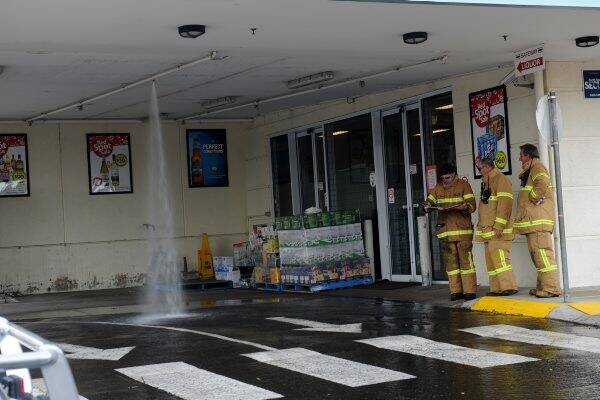 ALARM: Firefighters at the scene in Lansell Plaza. Picture: JULIE HOUGH