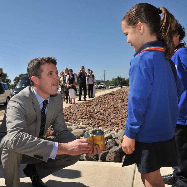 Prince Frederik is greeted by children in Castlemaine. Picture: BRENDAN McCARTHY