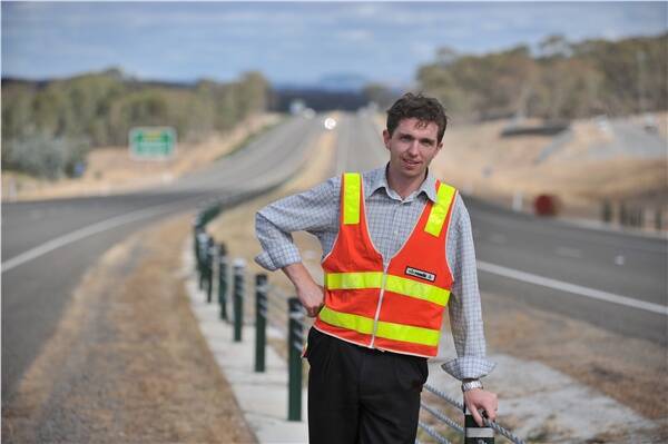 VicRoads team leader Nathan Mullane stands on the Calder Freeway section soon to be opened