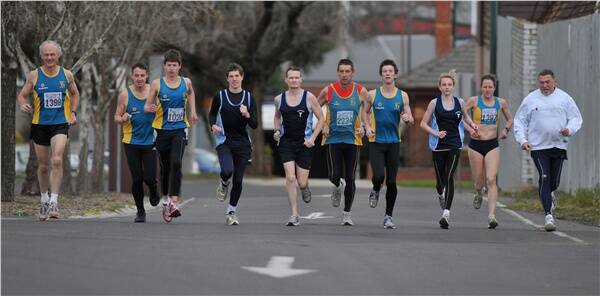 ON THE RUN: Hunter Gill, Craig Green, Jamie Cook, Kaine Leech, Trevor Kelly, Peter Cowell, Cody Williamson, Madeleine Evely, Meredith Cook and Ian Carmichael warm up for tomorrow’s Athlete’s Foot-backed Keith Huddle Memorial Eaglehawk to Bendigo.