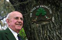 FAMOUS SPOT: Kangaroo Flat Football Club treasurer George Edwards at Dower Park's Tree Of Knowledge.