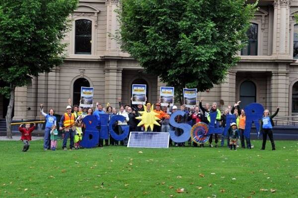 BRIGHT FUTURE: Members of the Bendigo Sustainability Group get behind the launch of Big Solar in the city’s civic gardens. Picture: Jim Aldersey