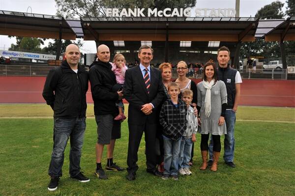 TRIBUTE: John Brumby with Brent, Rik, Lucy, Raelene, Jane and Holly McCaig, Luc Gilmore and Wil and Toby McCaig (front) at the opening of the stand.