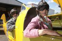 TAKE-OFF: Letty and Laurie Brown with their Tiger Moth aeroplane.