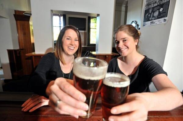 Hops to it: Nicole Birks and Prue Morrow enjoy a beer at the Rifle Hotel ahead of tomorrow’s Women in Beer event.