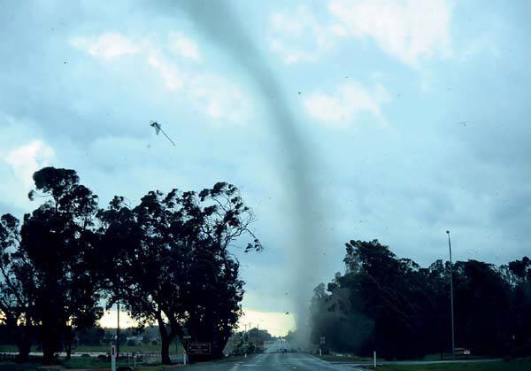 A road sign flies through the air as a tornado hits Moama. <i>Picture: Jenna Natalizio</i>