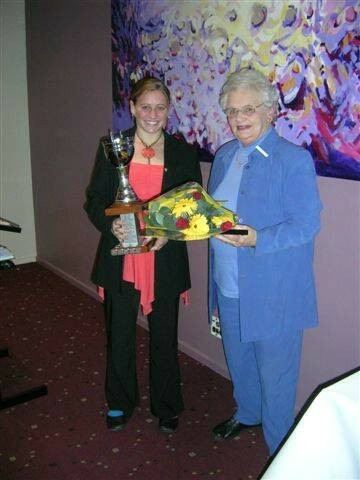 HONOUR: Bree Mellberg receives her award from Judy Scarrott.