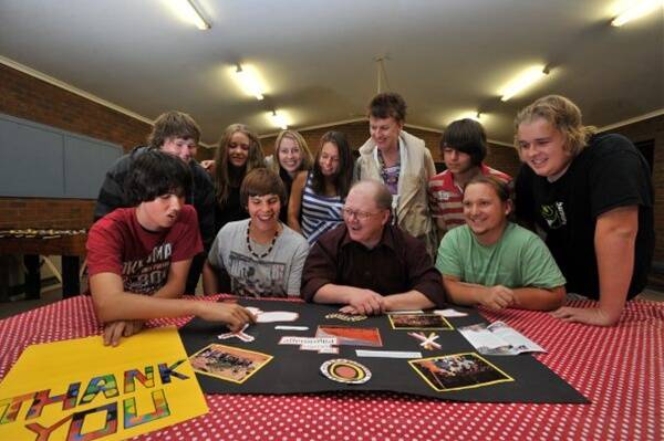 Pilgrims: Don Goodman (seated, third from left) and the City of Greater Bendigo’s Barb Dalloway (standing, fifth from left) are pictured with the Fusion teens, seated, Shaun Farrell, Robbie Coates and Josh Lee; standing, Thomas Lovelace, Kirsten Shand, Lauren Fakehinde, Taylor Ahmangan, Shannon Beer and Josh Collins. 