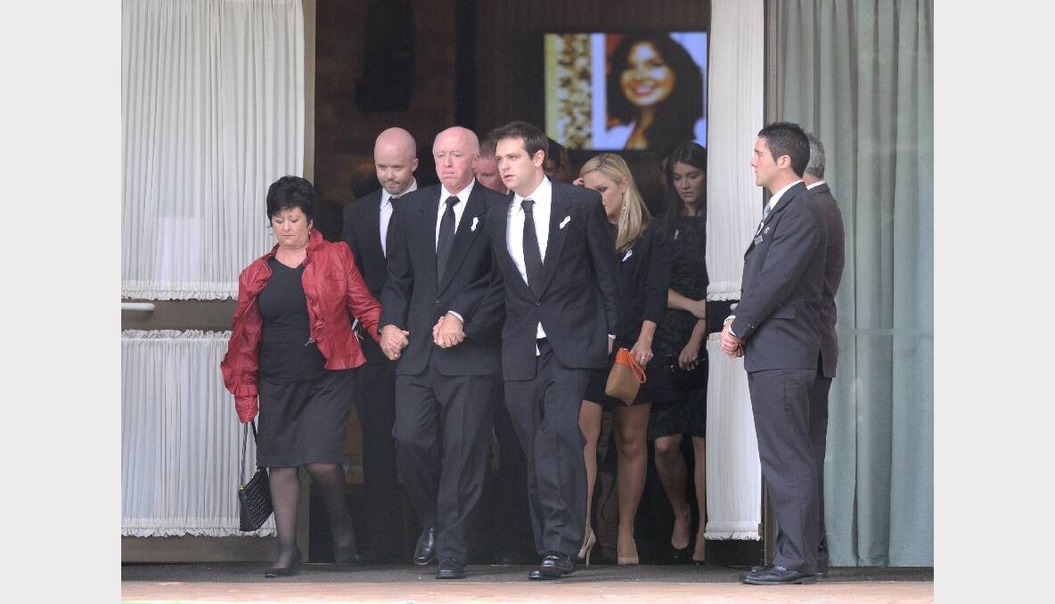 Jill Meagher's mother Edith and (from left) father George and husband Tom leave the memorial service. Photo: JUSTIN McMANUS
