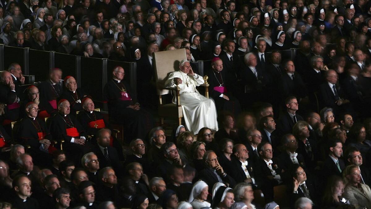 Pope Benedict XVI watches the movie "Karol, un uomo divenuto papa" ("Karol, a man who became Pope"), to remember the late Pope John Paul II at the Vatican in this May 19, 2005 file photo. Photo: REUTERS