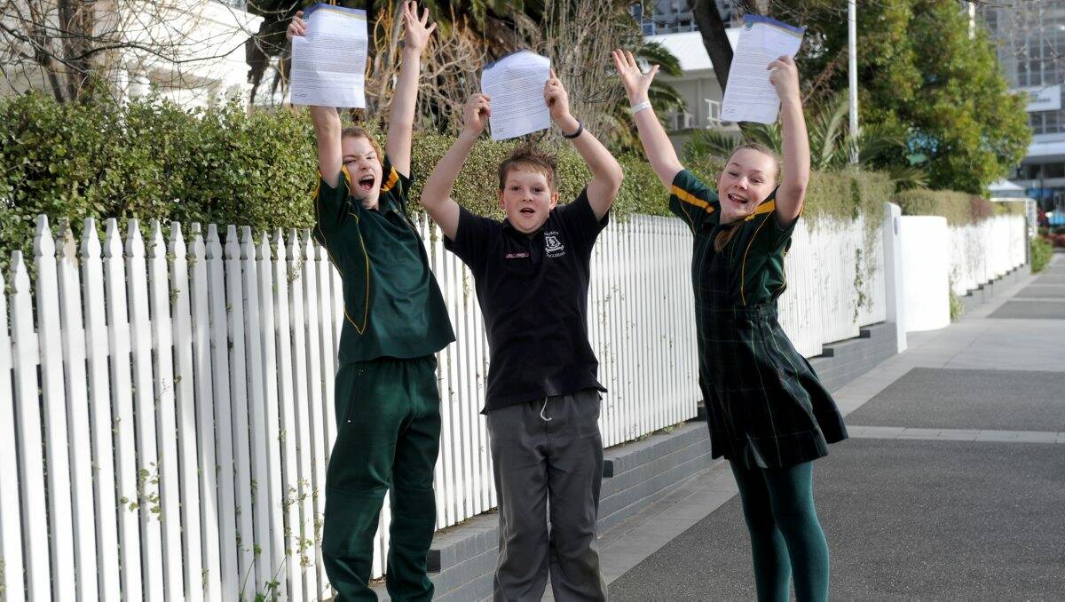 Brehana Danger, Jake Boyd and Sharni Barker with their acceptance letters to the future Marist College in Maiden Gully. Picture: Jodie Donnellan