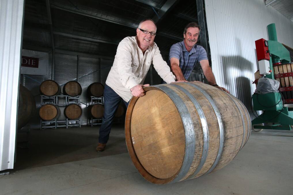ROLL THEM OUT: Heathcote wine producers Richie Condie of Condie Estate and Norbert Baumgartner of Mia Valley Estate. Picture: PETER WEAVING