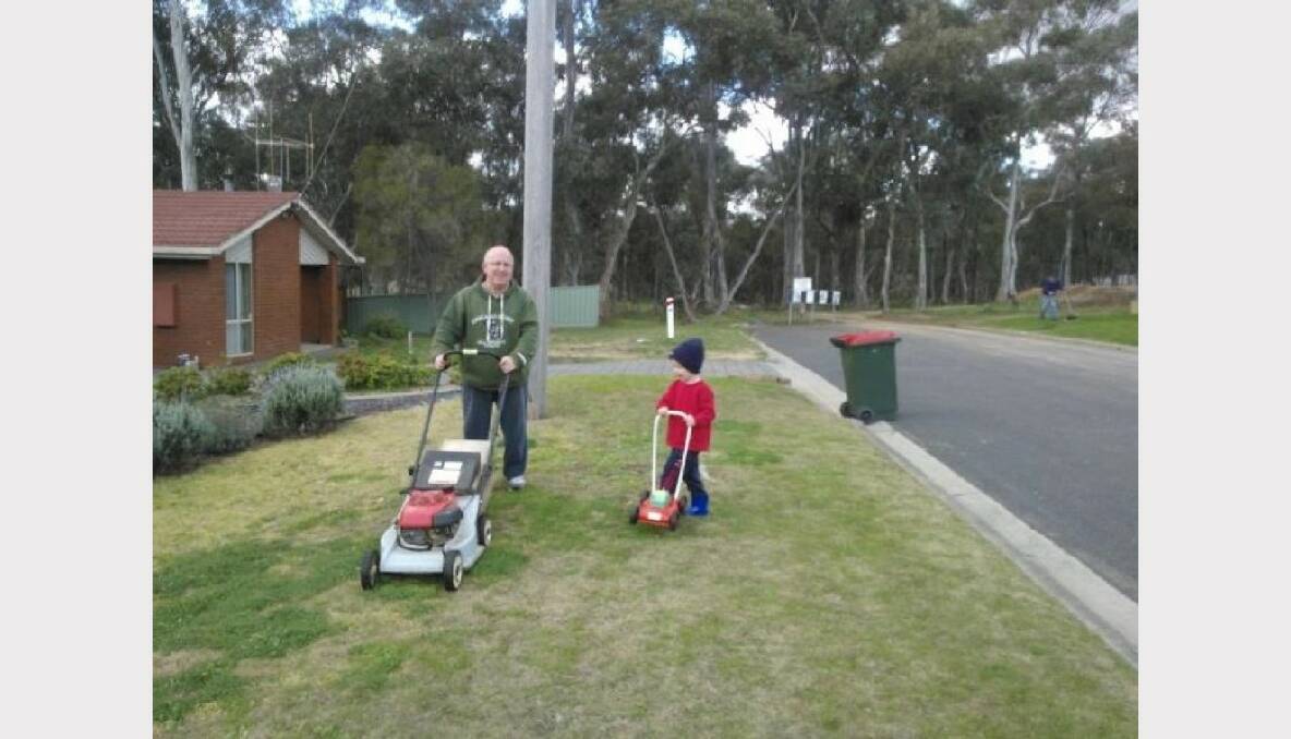"Helping". Max Claridge helping his Grandpa mow the lawn. By Bruce Claridge