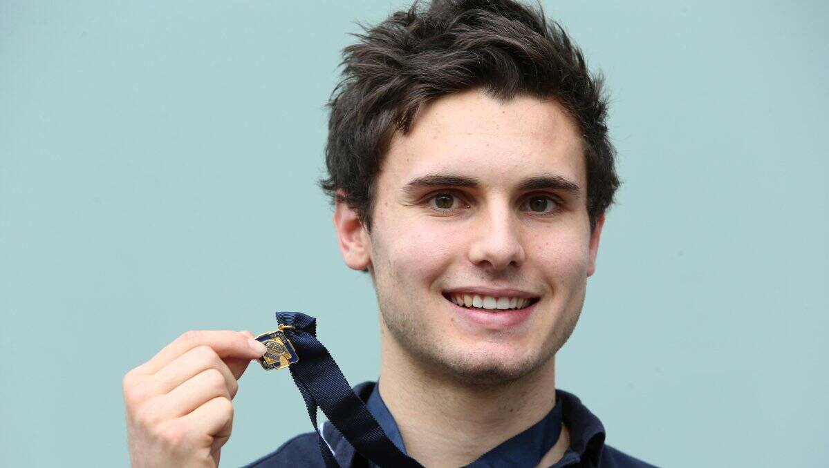 AMAZING FEAT: Bendigo Pioneer Jacob Chisari proudly holds the Morrish Medal for being a TAC Cup best and fairest. Picture: PETER WEAVING