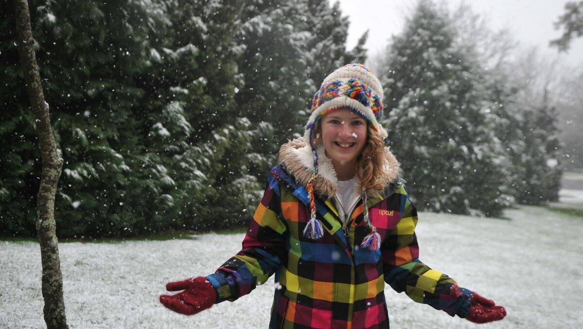 Teya Griff enjoys the snow at Wombat Hill in Daylesford. Picture: Kyle Barnes