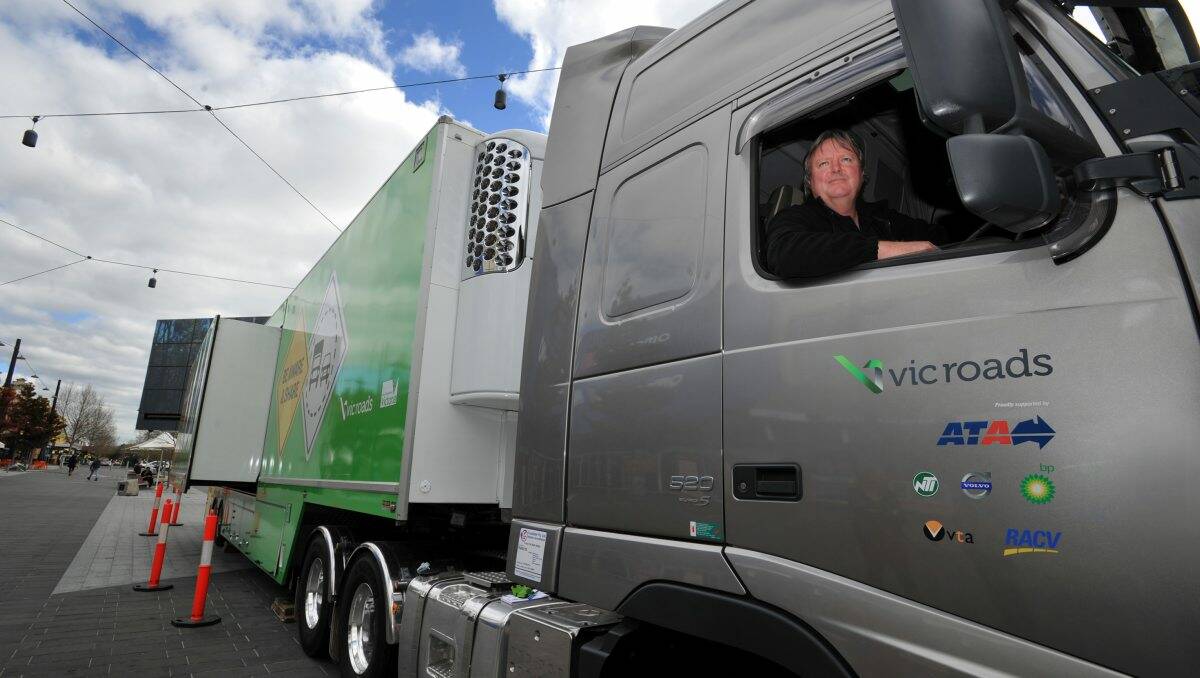 EDUCATIONAL: Glen Schmidtke helps educate people about sharing the road with trucks during a VicRoads road show. Picture: Julie Hough