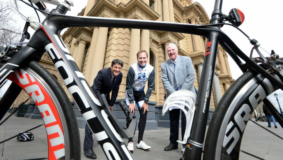 Cycling coup: City of Greater Bendigo’s Stan Liacos, Olympic gold medallist Scott McGrory and Victorian Open Road Championships organiser John Craven welcome the news Bendigo will host the major cycling race.  Picture: Jim Aldersey