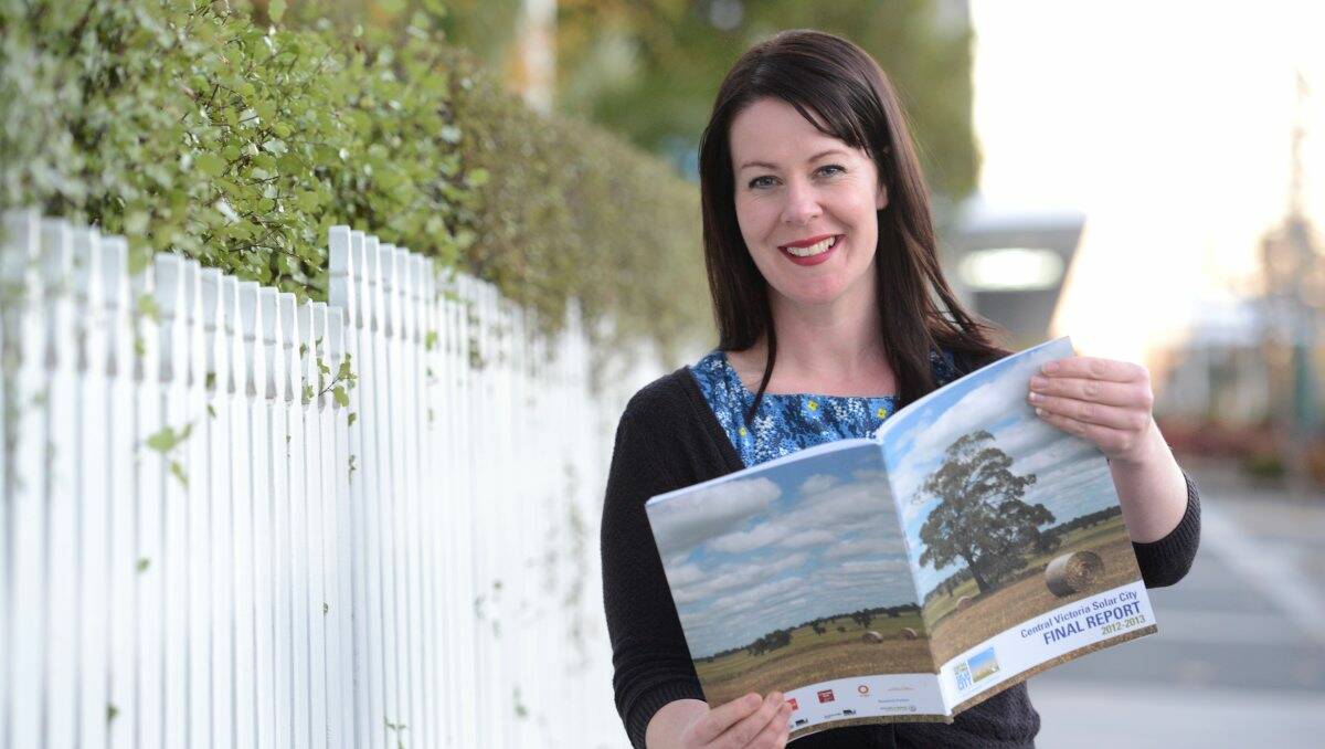 Sustainable Regional Australia chief executive Leah Sertori with the SRA Final Report for 2012-13. Picture: Jim Aldersey