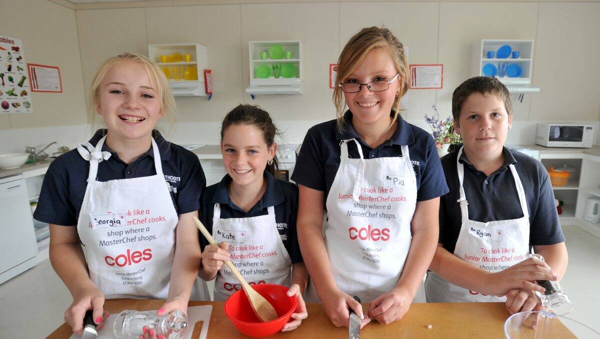 CHEFS: Heathcote primary school students Georgia Edsall-French, Kate Bordin, Pia Segafredo and Ryan Comer get cooking at the Stephanie Alexander Kitchen Garden. Picture: JODIE DONNELLAN
