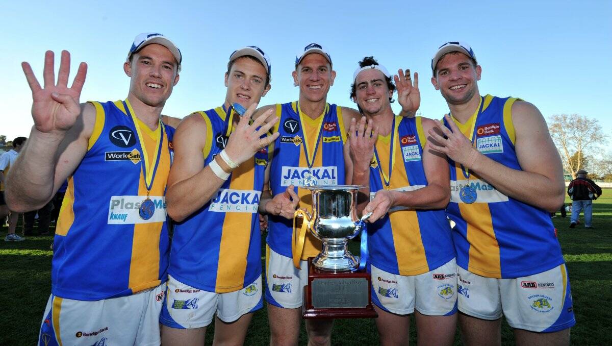 FOUR IN A ROW: Mark Lloyd, Jack Geary, Matt O'Toole, Adam Baird and Dale Young with the Bendigo Advertiser premiership cup. 