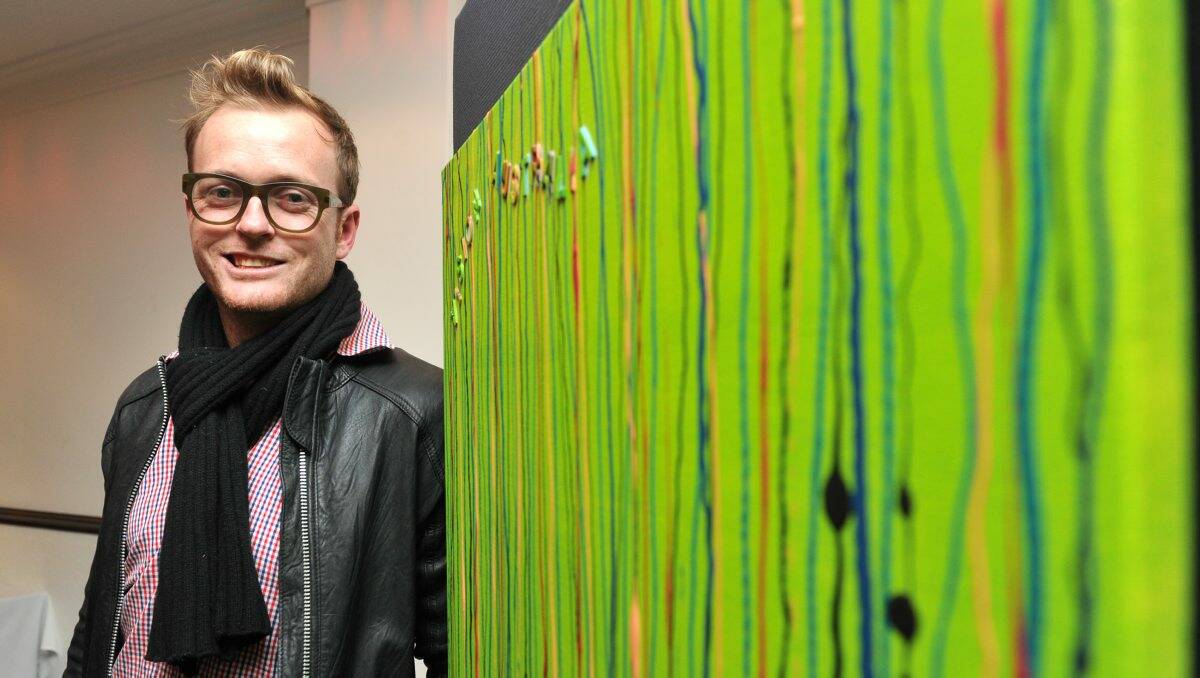 creative: Todd Harrington from Jimmy Possum/Honey Eater with his painting ‘The Vision’. Picture: Jodie Donnellan