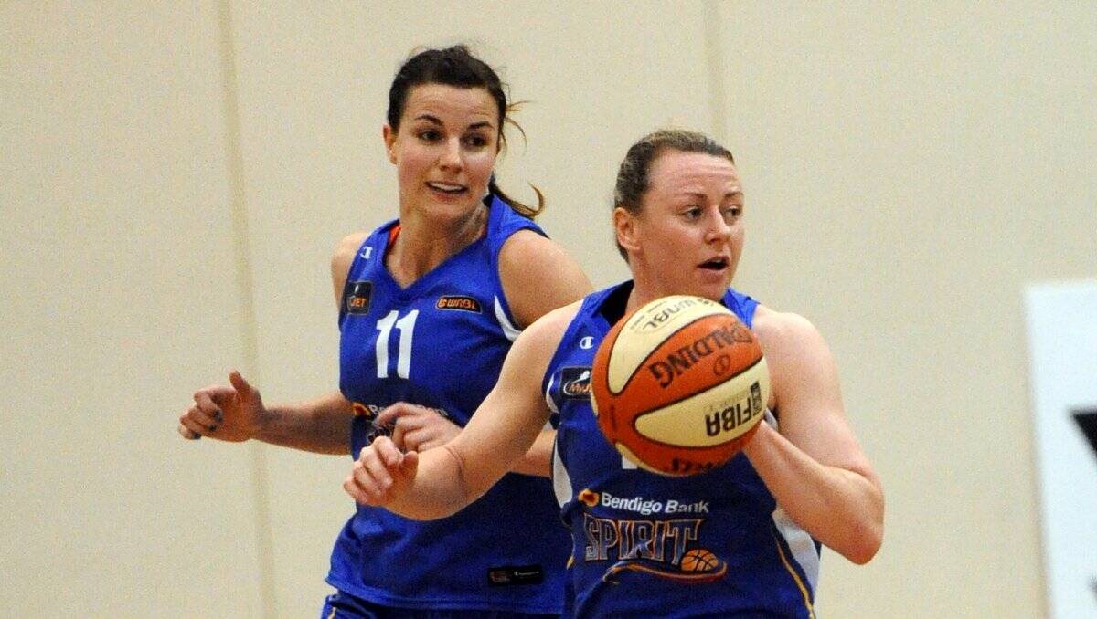 PLAYING ON: Bendigo Spirit and Australian Opals star Kristi Harrower will continue to play a key on-court role in the WNBL 2012-13 season. 