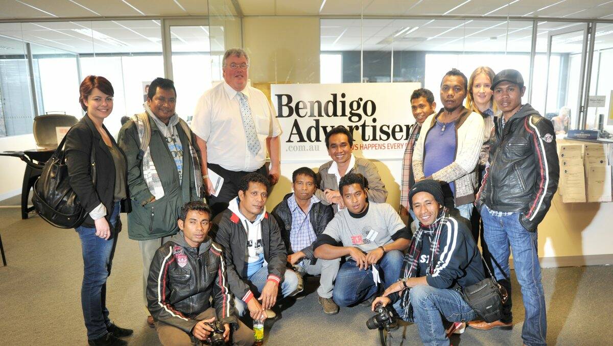 BONDS: Bendigo Advertiser editor Rod Case with senior staff from five community radio stations in East Timor on a visit to Bendigo.