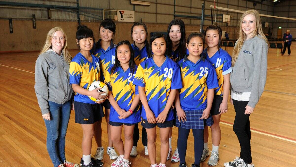 SPORTING CHANCE: The BSE Karen Dragons volleyball team. Back: Caitlin Molloy, Snora, Say Ka Trace, Thuroutsu, Tar Tha Blay, Lauren Harvey. Front: Ba Blu Soe, Paw Ler Moo, Thain Win and Paw Kalu Mu. Absent: Ba Blu Paw Picture: PETER WEAVING
