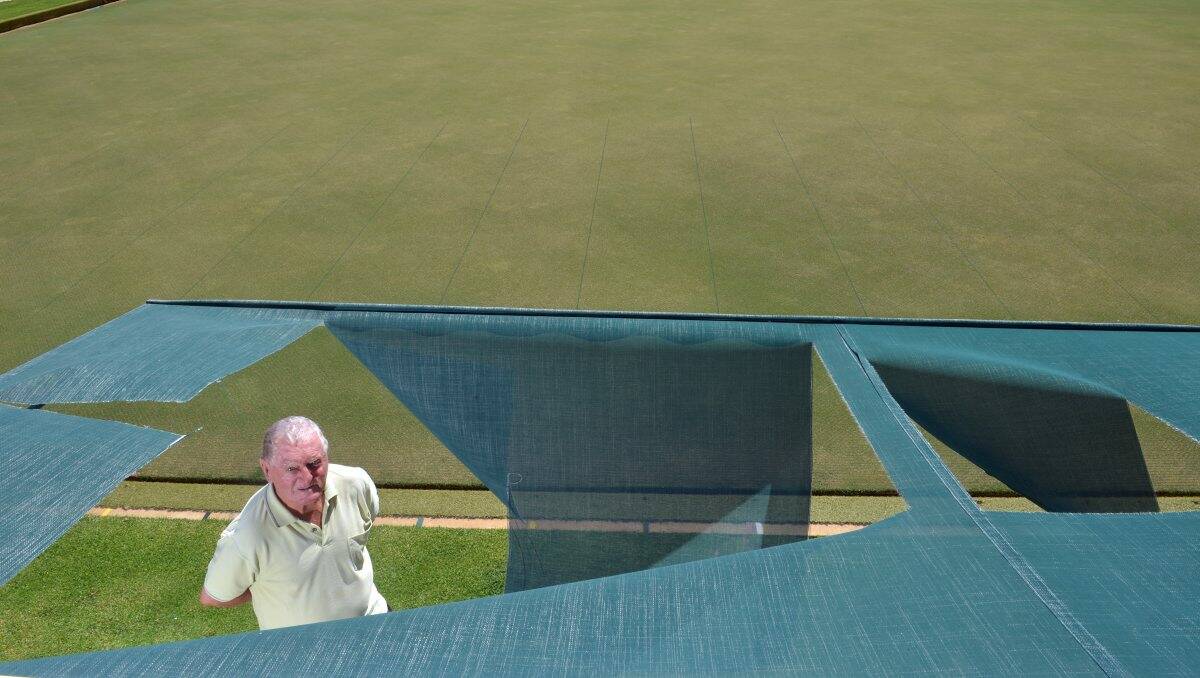 COSTLY: Norm Grenfell inspects the damage after vandals struck at the Eaglehawk Bowling Club. Picture: BRENDAN McCARTHY