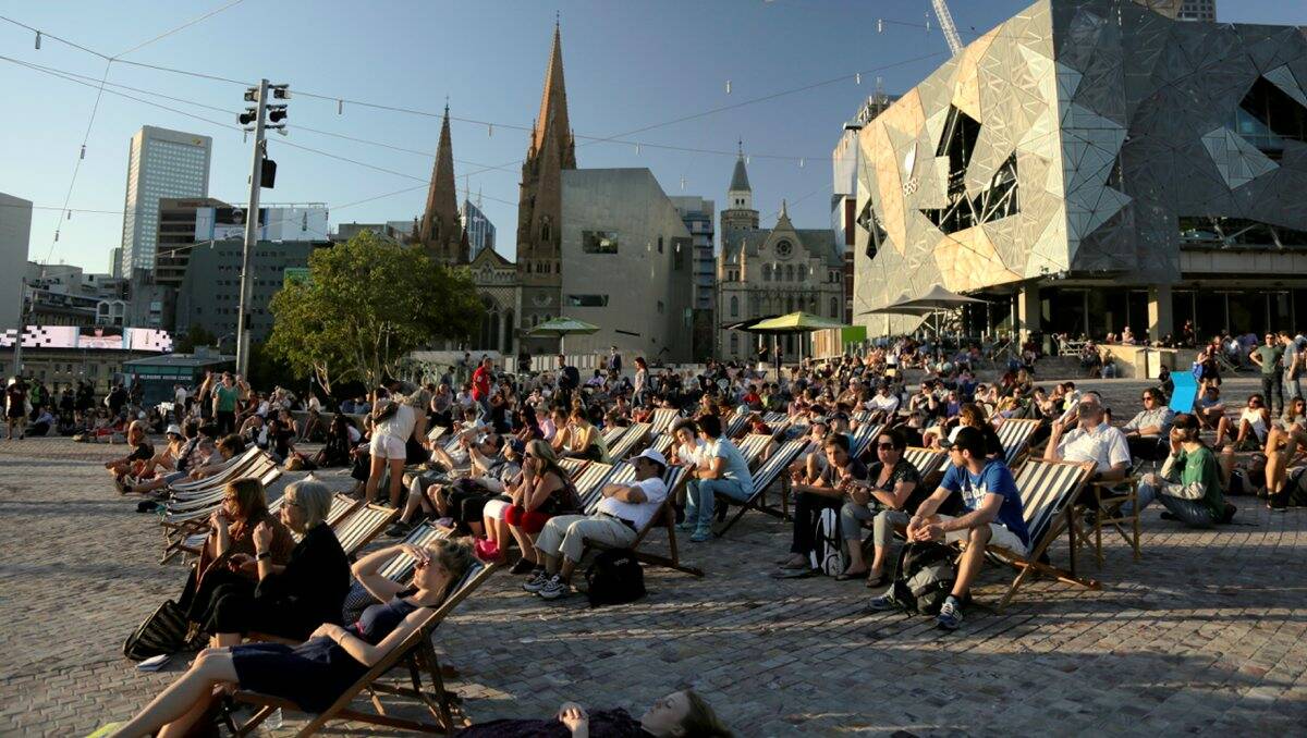 CROWD: People at Federation Square in Melbourne watch Jessie Taylor’s documentary. Picture: Supplied