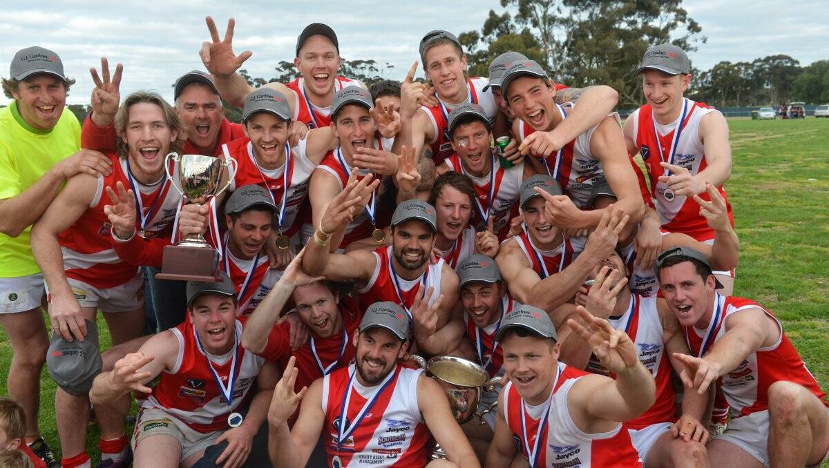 WELL-OILED MACHINE: Bridgewater players celebrate after defeating Newbridge in the Loddon Valley Football League seniors grand final. Picture: BRENDAN McCARTHY