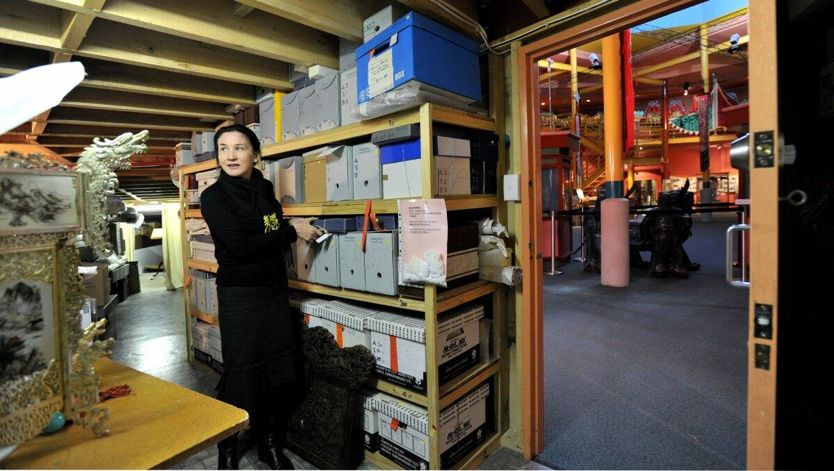 High hopes: Museum manager Anita Jack in the overcrowded store room. Picture: PETER WEAVING