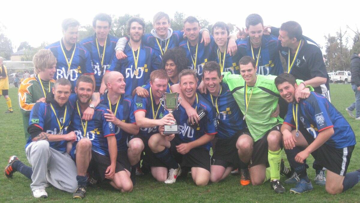 TOP OF THE TREE: Eaglehawk's division one team celebrates its unbeaten season. Picture: SUPPLIED